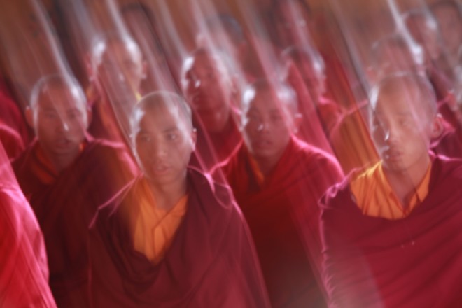 Antonio frames the Bhutan monks basking in the light