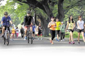 CYCLISTS and runners at UP Diliman NIÑO JESUS ORBETA