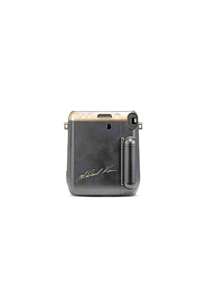 Back view of the camera with the fashion designer’s signature in metallic gold