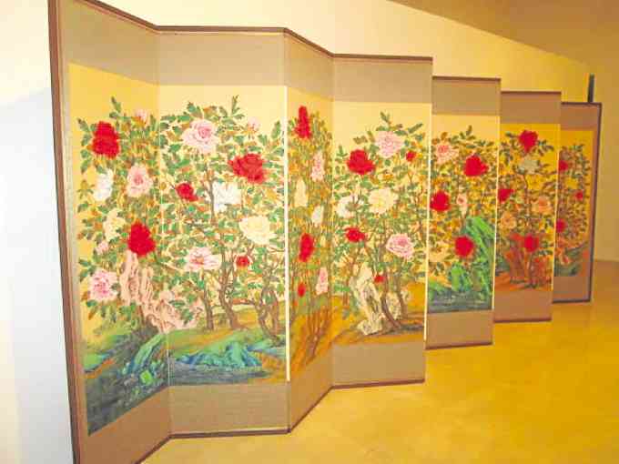 Folding screen designed with "Painting of Peonies,” symbolizing wealth and prosperity.