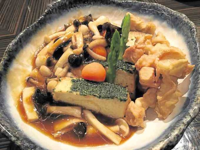 Homemade tofu with asparagus and mushrooms