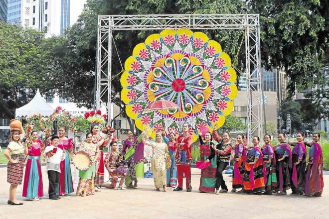Kultura’s performers pose in front of the Parol