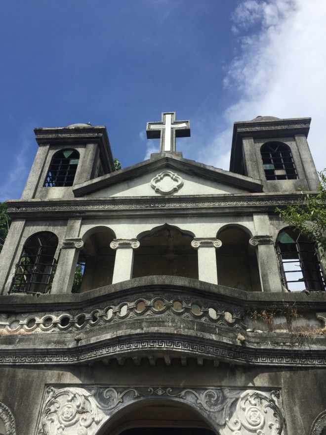 While this cathedral-looking masoleum clearly incorporated Catholic architecture, the tomb inside is shaped like a turtle like older Chinese tombs. KRISTINE ANGELI SABILLO