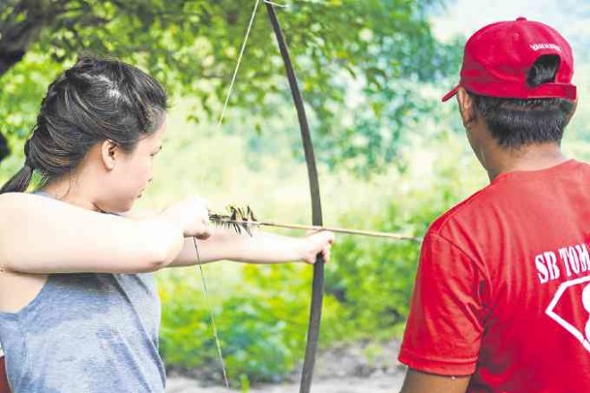Aetas enjoy teaching guests archery, one of their main modes of hunting.
