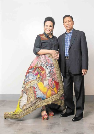 Mellie Ablaza in a Ralph Lauren top and a quilted skirt by Steve de Leon that matches her Dolce & Gabbana shoes. Husband Louie sports a denim suit by R.M. Manlapat