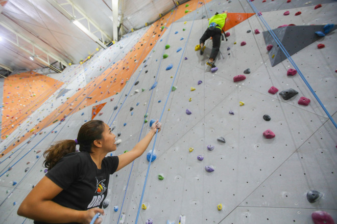 Clarice Calolot (foreground) acts as belayer to Francesca Solis (above)