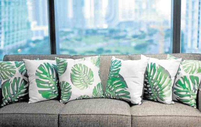 Update the look of your couch with a fresh set of throw pillow covers. This tropical leaf-print set is hypoallergenic and machine-washable.