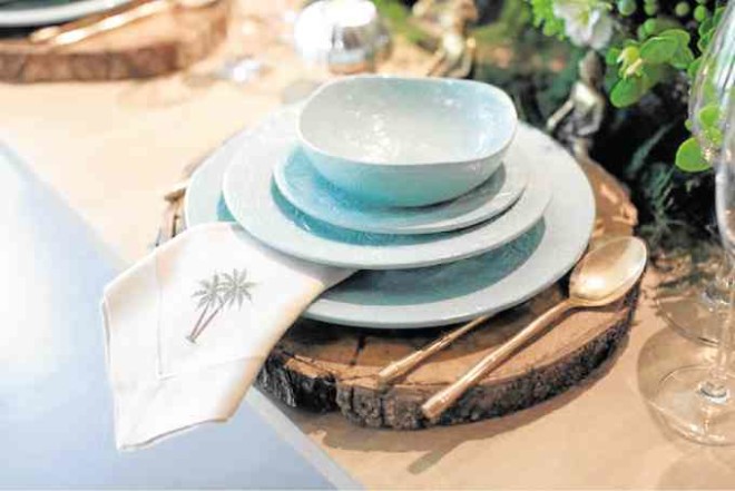 Powder-blue-gray flatware setwith palm-tree-print napkin