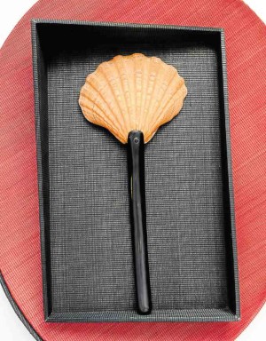 Decorative shell ladle by Ian Giron