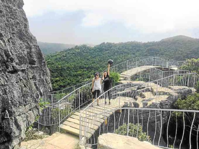 Bridges connect the limestone pillars at the Nanay rock formation.