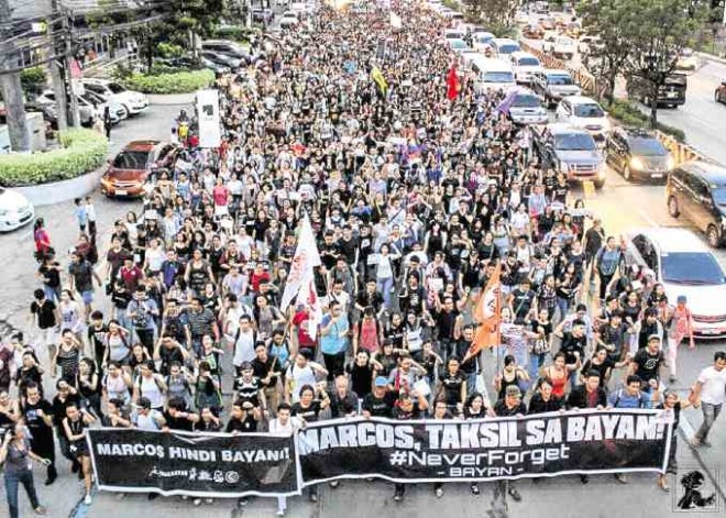 Student protesters march with militant groups on Katipunan Avenue, Quezon City, on theway to the People Power Monument. —BONG BANAL, FACEBOOK