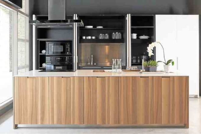The Boffi Aprile Kitchen by Piero Lissoni,with countertop in Corian and panels in Core Walnut 3D