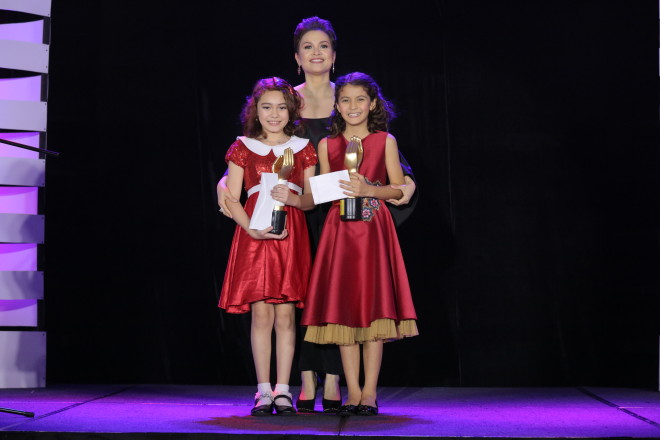 “Annie” lead stars Krystal Brimner and Isabeli Araneta-Elizalde pose onstage with the original 1980 “Annie” Ms. Lea Salonga during the 29th Aliw Awards. CONTRIBUTED IMAGE/RWorld Manila