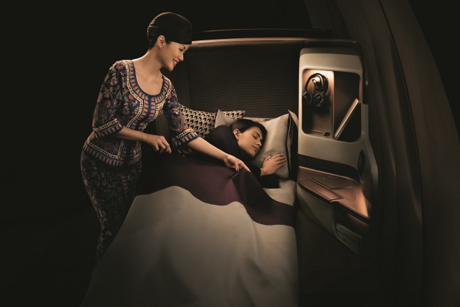 Singapore Airlines' new-generation business call, which pulls out to a fully flat bed.