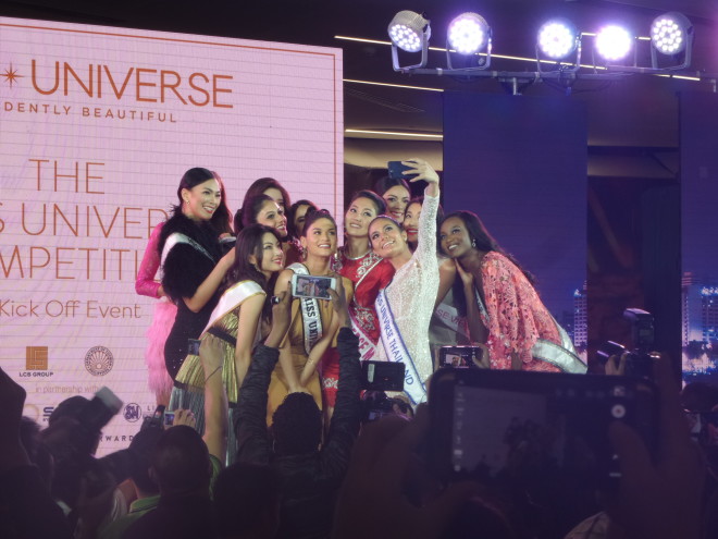 Reigning Miss Universe Pia Alonzo Wurtzbach is flanked by Miss Universe delegates (from left Kezia Roslin Warouw of Indonesia, Caris Emily Tiivel from Australia (partly hidden), Sari Nakazawa from Japan, Kiran Jassal from Laysia, Jenny Kim from Korea (partly hidden)Tania Paulin Dawson from New Zealand (partly hidden), Htet htet Htun from Myanmar, Chalita Suansane from Tahiland, Maxine Medina from the Philippines, Dang Thi Le Hang from Vietnam, and Deshauna Barber from the United States, at the kick off event held at the S Maison Mall of Conrad Hotel in Pasay City on Saturday evening. ARMIN P. ADINA