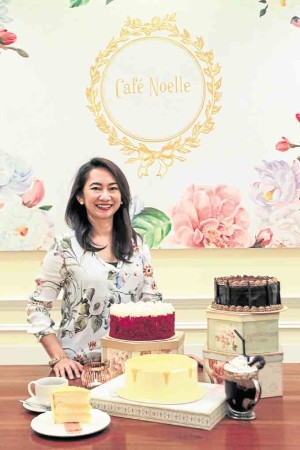 Chef Judy Uson with her baked masterpieces at CaféNoelle in SM