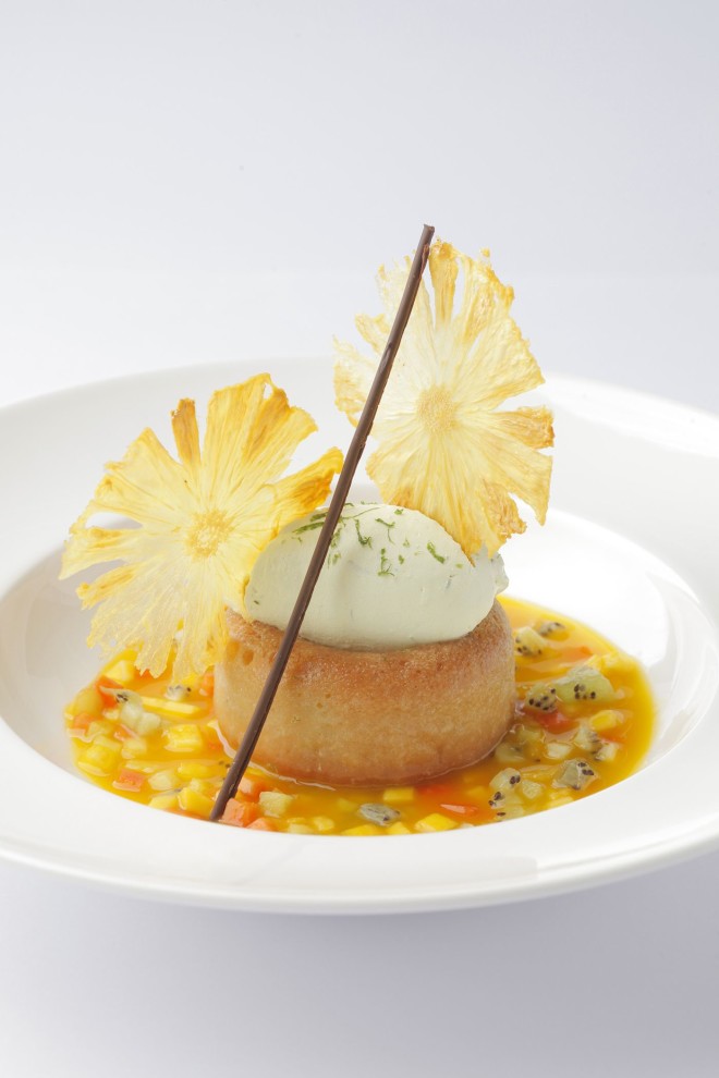 Rum Baba, coconut and lime juice panna cotta, mango and passion fruit sherbet at Mireio