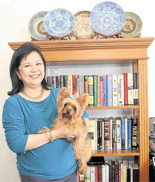 Cecile Yasay, wife of Foreign Secretary Perfecto “Jun” Yasay Jr. with her Yorkshire terrier Chloe. Her position as the wife of the foreign secretary comeswith responsibilities not faced by other Cabinet spouses. —ARNOLDALMACEN