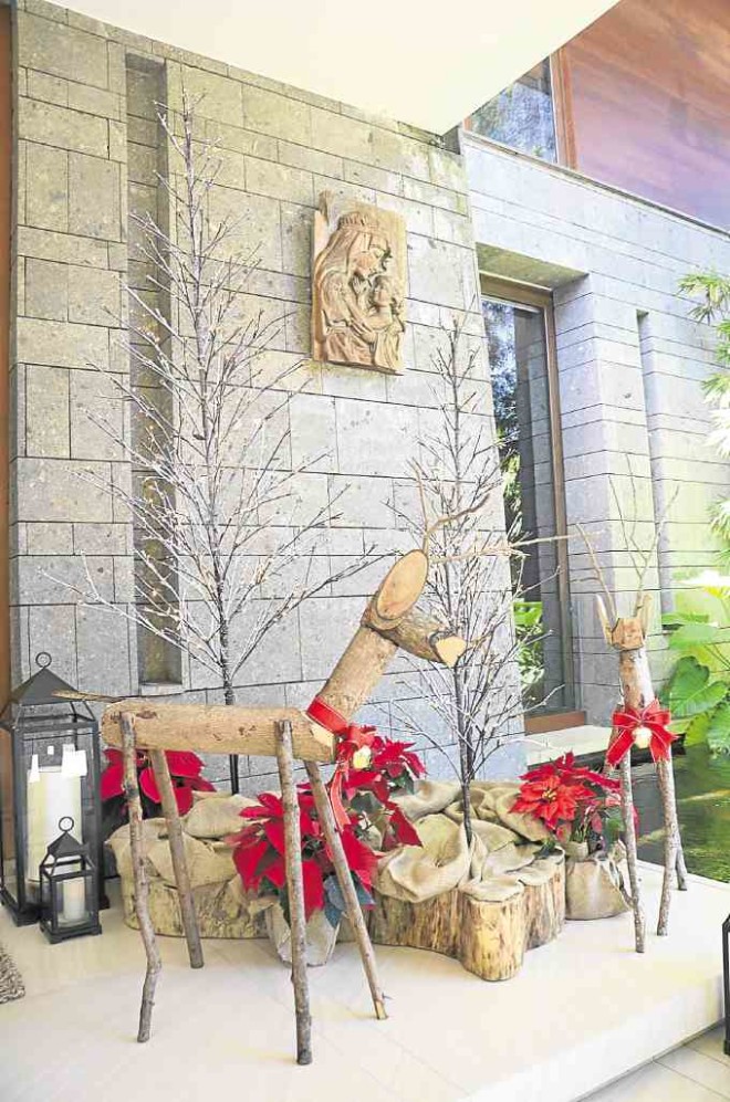 Wooden reindeer made out of tree trunks felled by Typhoon “Glenda,”which dot the property all year round, are updated for the season with red bows around their necks, and greet guests at the house’s entrance.