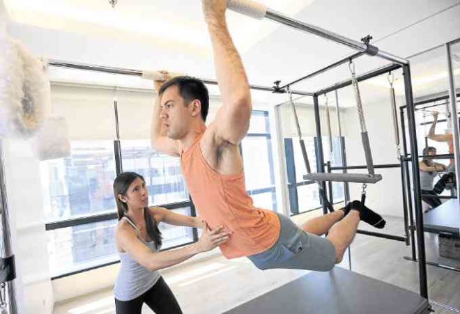Sean Anthony, the 6’4” Canadian-Filipino pro basketball player, fires up muscles he never knew existed, thanks to Pilates. —FILE PHOTO