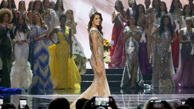 Iris Mittenaere of France walks down the ramp shortly after being proclaimed the Miss Universe 2016 in coronation Monday, Jan. 30, 2017, at the Mall of Asia in suburban Pasay city, south of Manila, Philippines.(AP Photo/Bullit Marquez)