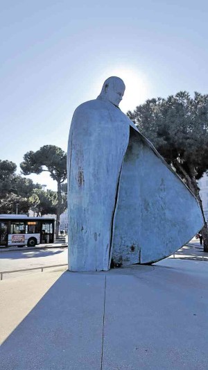 Pope John Paul II’s statue in front of the Palazzo Massimo, near the Piazza della Repubblica and Termini Railway Station