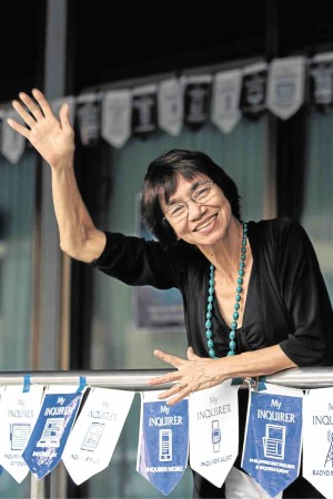 Monica after her awarding as a 10-year employee of the Inquirer in December 2015