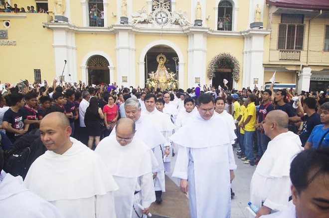 Dominicans friars leading the annual grand procession of Our Lady of the Rosary of Manaoag every October—PHOTOS BY LESTER G. BABIERA