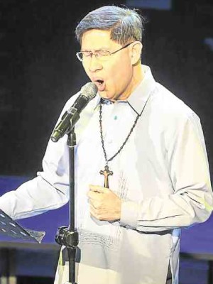 Luis Antonio Cardinal Tagle sings the invocation.