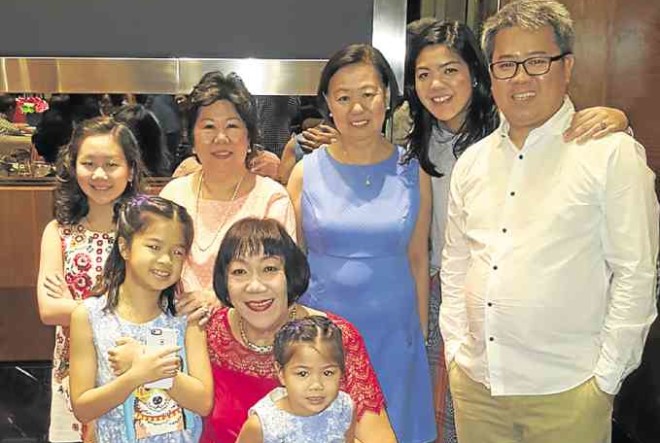 Celine Bautista with grandchildren Sam and Andrea Joson. Standing: Achie and Lulu Chung, Cora Joson, Chin-Chin and Sul Joson