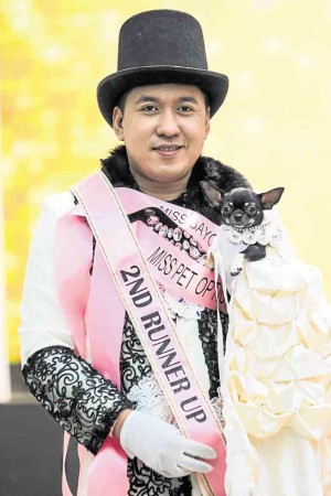 Second runner-up Adrian Cabuhat with his Chihuahua, Coco Chanel —LEO M. SABANGAN II