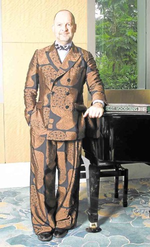 Gert Voorjans looking dandy in Dries Van Noten double-breasted suit with chinoiserie prints.
