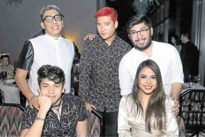 BJ Pascual (seated), Jojie Dingcong and Tim Yap