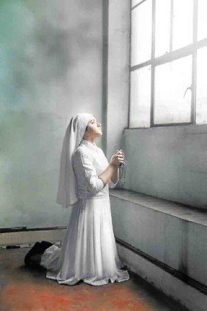 Rebecca Coates as Agnes in Repertory Philippines’ “Agnes  of God,” opening Feb. 17, directed by Bart Guingona  —Photo courtesy of Repertory Philippines 