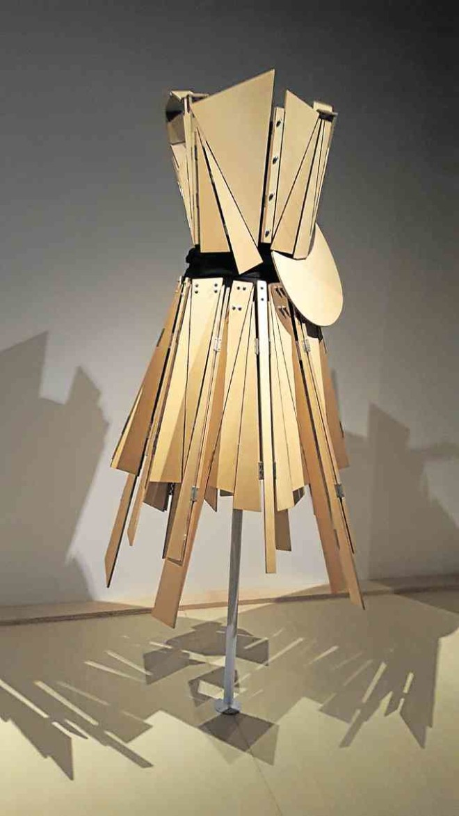 Is it a dress or amuseum piece? Yohji Yamamoto constructs an armor-like “garment” that breaks further barriers in fashion.