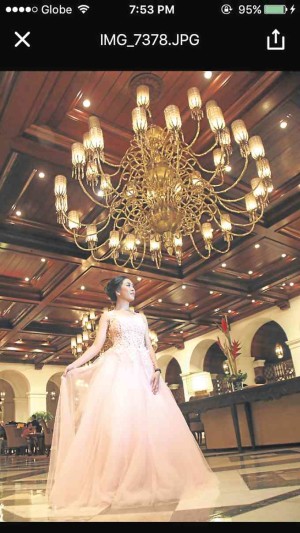 The debutante in gowns from Landmark and Dragon 8 Mall