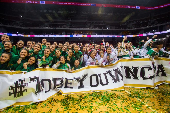 Happy winners and participants pose with the To be You WNCAA banner. —PHOTO BY GERALD REBULADO