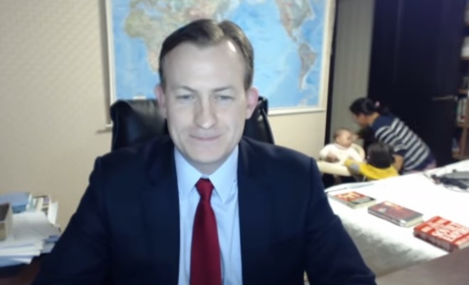 BBC's Robert Kelly and his wife and children in a screengrab of a video interview that has now gone viral. YOUTUBE