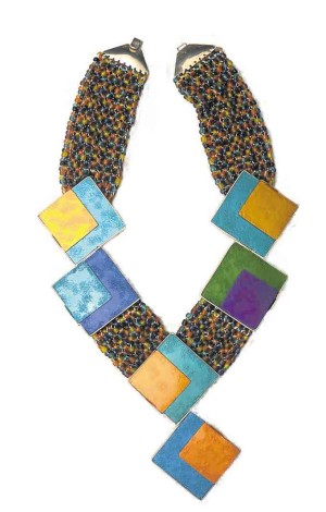Coseteng incorporated square-shaped brooches and complementary glass beads in this choker. 