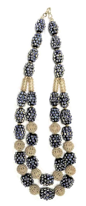 Coseteng mixes glass beads with gold, brass and semiprecious stones to dazzling effect.