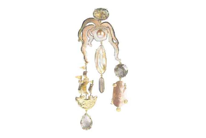 Large pendant featuring a carved mother-of-pearl octopus,with a repoussé galleon and antique carved crystal quartz