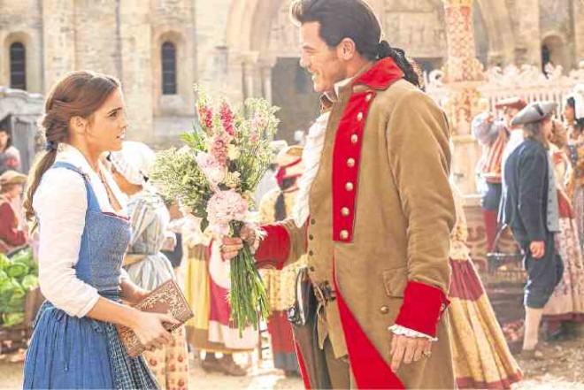 Emma Watson and Luke Evans in a scene from “Beauty and the Beast”—Photos courtesy of Walt Disney Studios