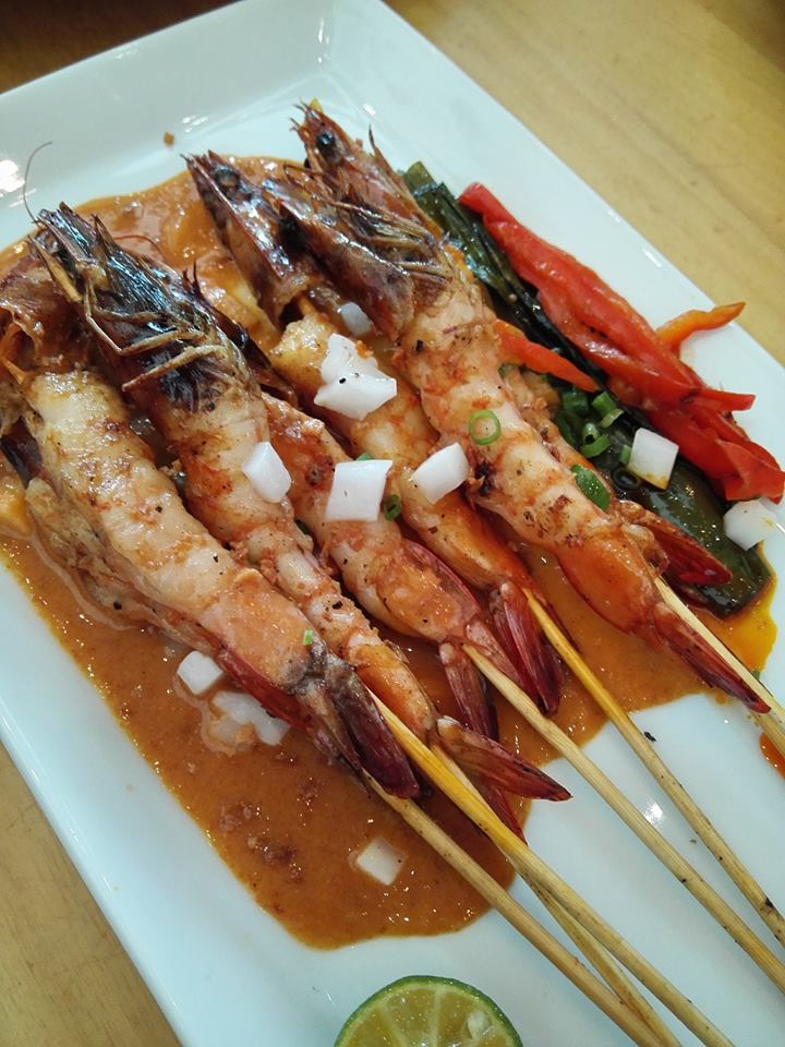 Grilled prawn skewers with talangka sauce and coconut milk
