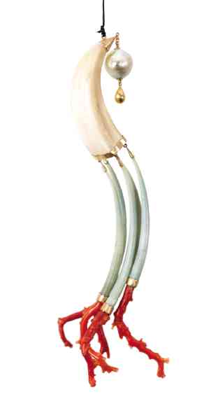 Boar’s tusk with dangling pearl, shell, white coral and gilt silver strands with coral
