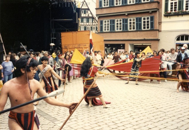 Peta actors performing a scene from “Panata sa Kalayaan” (1983) in a town square in Europe