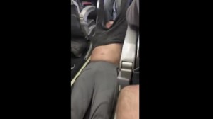 Man being dragged from Untied Airlines flight - 9 April 2017