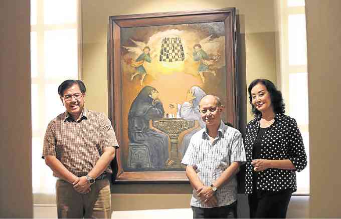 Saul Hofilena Jr., Guy Custodio and Gemma Cruz- Araneta with the artwork "Celestial Chess Players"