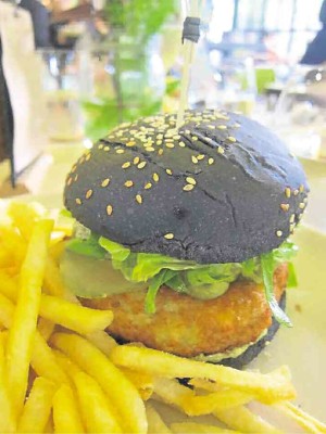 Fish burger at Open Farm Community, which grows some of its vegetables 