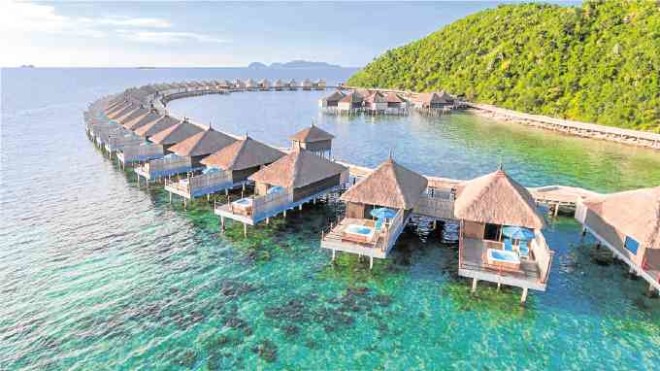 AtHuma Island Resort & Spa, eachWater Villa has an unobstructed sea view, a private sun deck and an outdoor tub and shower.