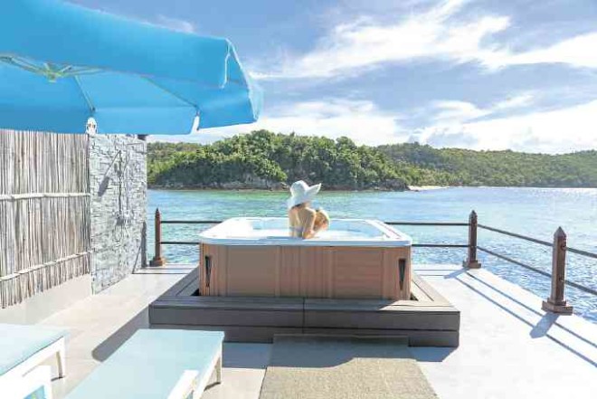 AtHuma Island Resort & Spa, eachWater Villa has an unobstructed sea view, a private sun deck and an outdoor tub and shower.